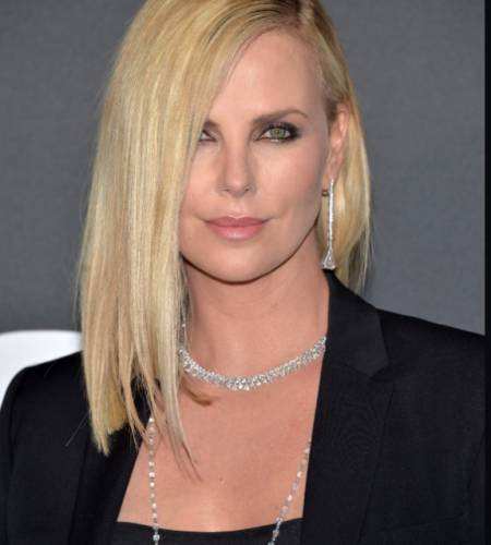 Charlize Theron shines in Chopard Jewelry to the Paris premiere of Fast and Furious 8